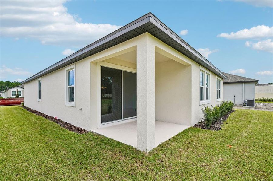 Exterior details and patio area of a home in Legends Preserve - Signature Series, Daytona Beach (Image 3).