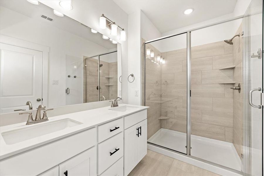 You'll never want to leave the oversized walk in shower in your new owner's bath!