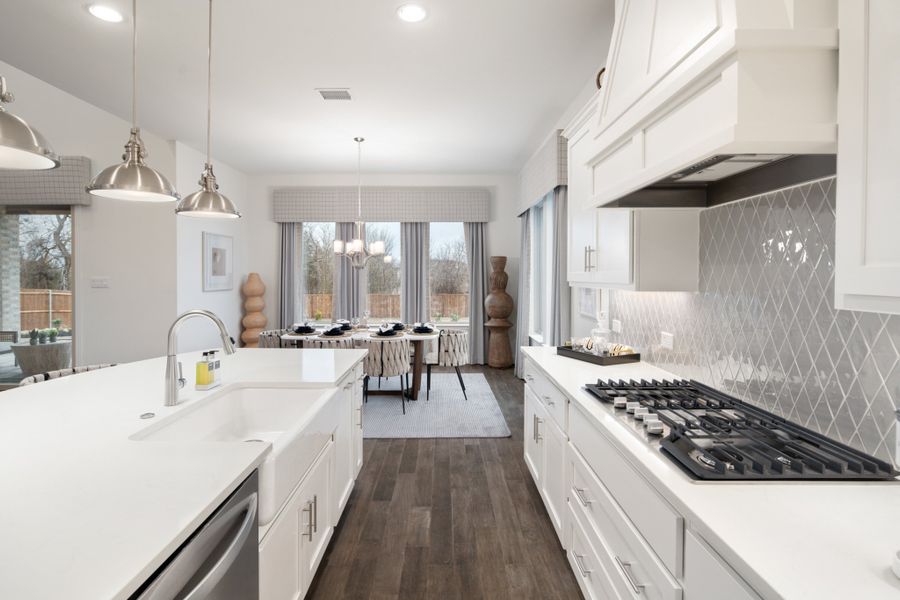 Representative furnished interior of a home built from the Kirby by UnionMain Homes in Lake Breeze, Lavon (Image 36).
