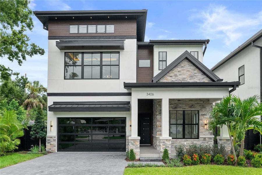 Front exterior of a new home in , Tampa, FL, highlighting curb appeal (Image 28).