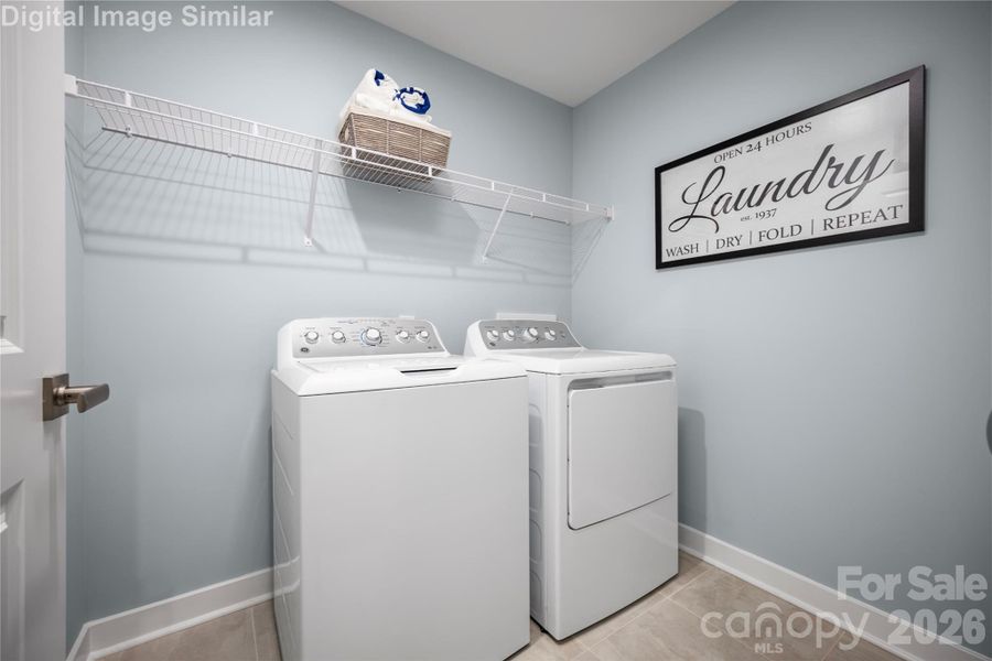 Laundry Room You'll Love.  Whether You're Sorting, Folding, or Tackling a Mountain of Towels, the Layout is Built for Efficiency.
