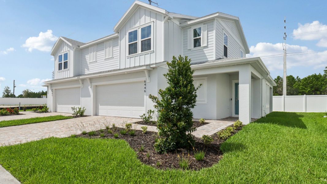 Exterior Monterey End Townhome by DRB Homes - Cyrene at Harmony in St Cloud FL