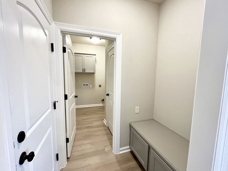 Front exterior of a new home in Emberly, Beasley, TX, highlighting curb appeal (Image 11).