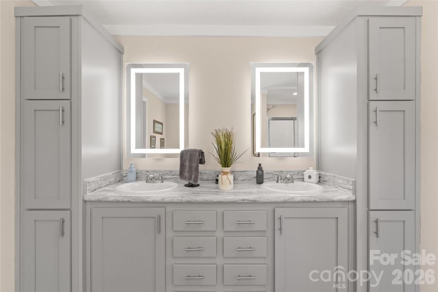 double vanity and linen storage double vanity and linen storage