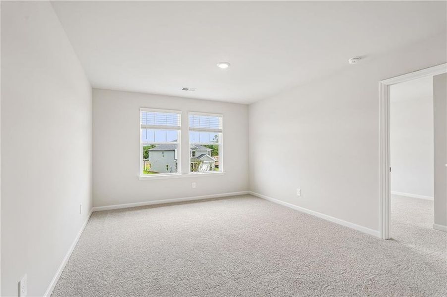 Spacious, unfurnished interior of a new home in Northwoods at Mirror Lake, Villa Rica (Image 52).