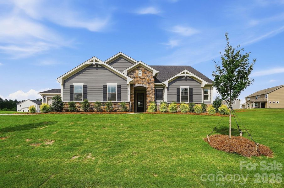 Front exterior of a new home in Blair Place, Monroe, NC, highlighting curb appeal (Image 29).