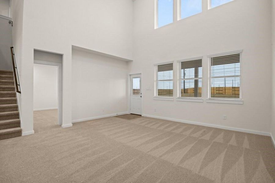 Spacious, unfurnished interior of a new home in Creekhaven, Iowa Colony (Image 13).