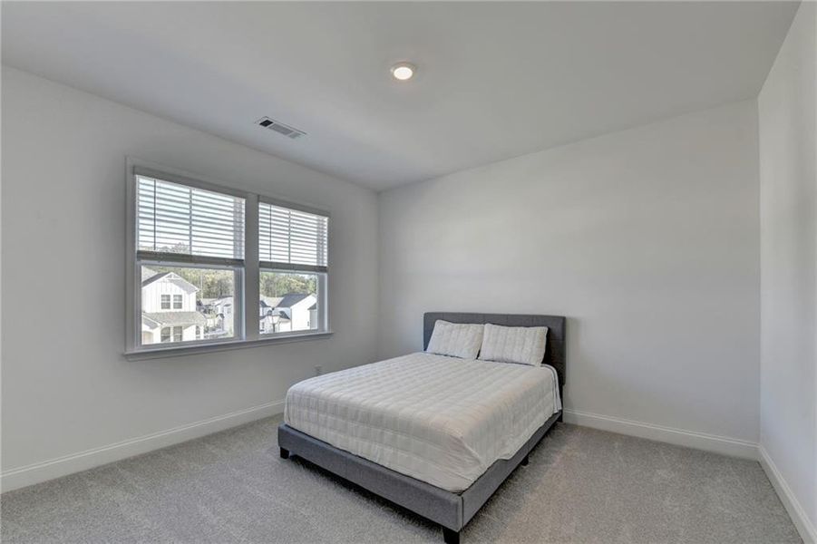 Furnished interior view inside a new home in Bailey Fence, Dacula (Image 56).