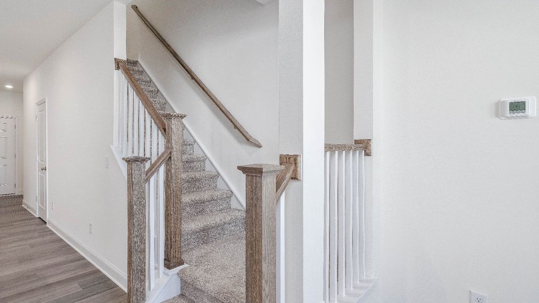 Furnished interior view inside a new home in Sidney Creek Townhomes, Zebulon (Image 13).