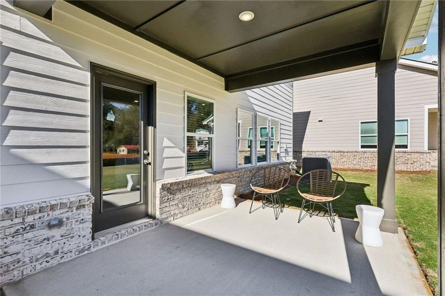 Exterior details and patio area of a home in Westmont Preserve, Powder Springs (Image 3).