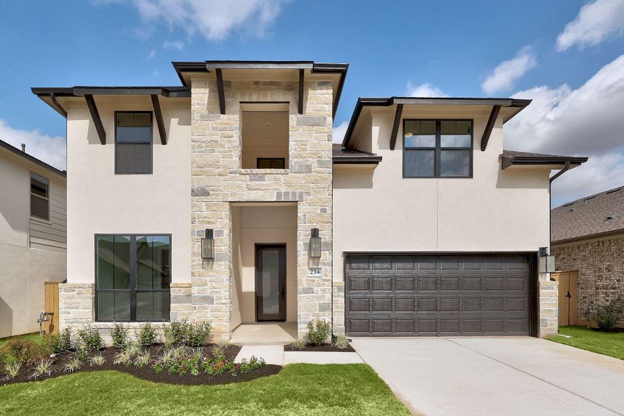 Front exterior of a new home in The Colony, Bastrop, TX, highlighting curb appeal (Image 2). Front exterior of a new home in The Colony, Bastrop, TX, highlighting curb appeal (Image 2).