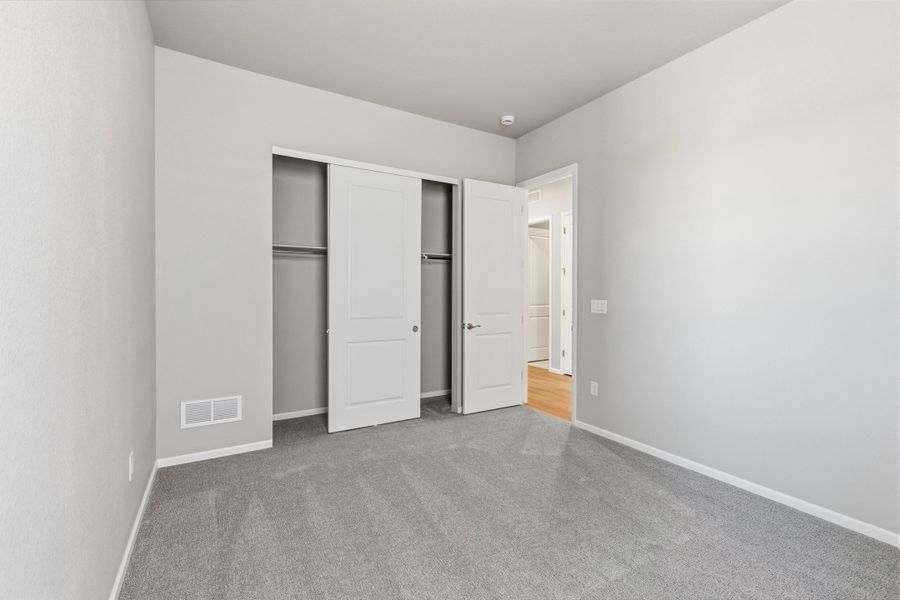 Spacious, unfurnished interior of a new home in The Estates Collection at Murphy Creek, Aurora (Image 19).