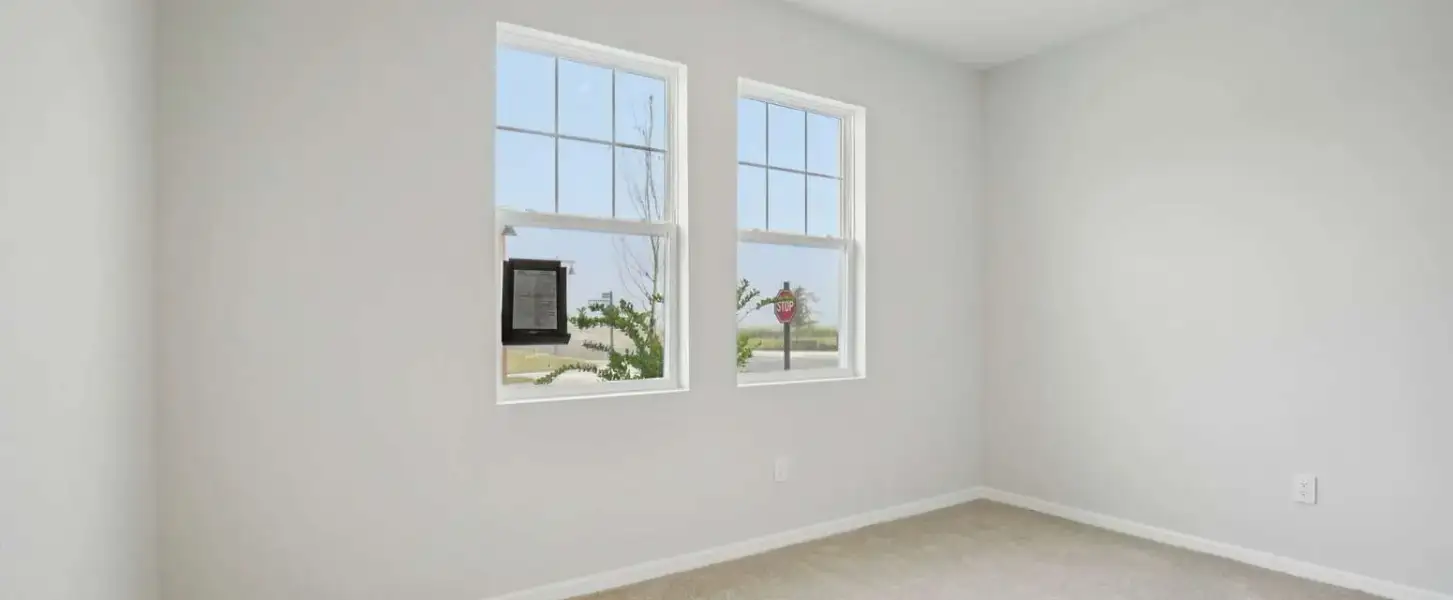 Bedroom 2 located off the front of the home - Representative images and renderings are for illustrative purposes. Actual structural options and design finishes of home may vary.