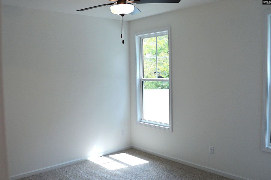 Spacious, unfurnished interior of a new home in Bickley Station, Irmo (Image 33).