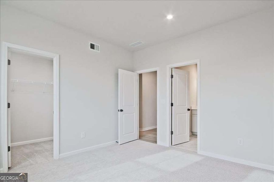 Spacious, unfurnished interior of a new home in The Paddocks at Doc Hughes, Buford (Image 47).
