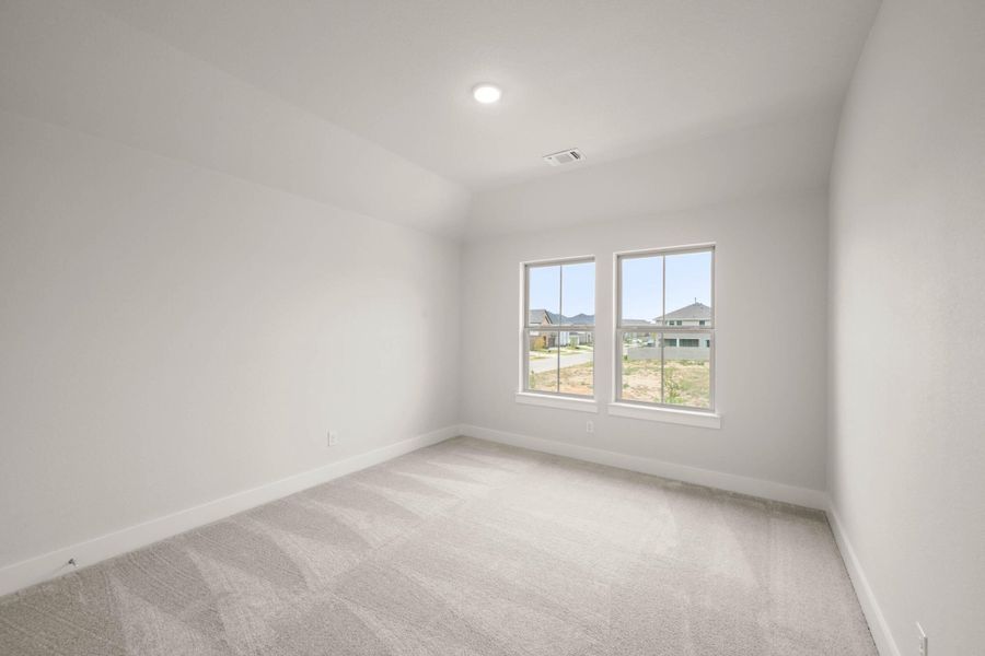 Spacious, unfurnished interior of a new home in Cottage Collection at Harvest, Argyle (Image 25).