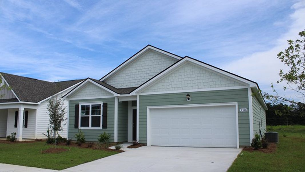 Front exterior of a new home in Auberon Woods, Conway, SC, highlighting curb appeal (Image 2).