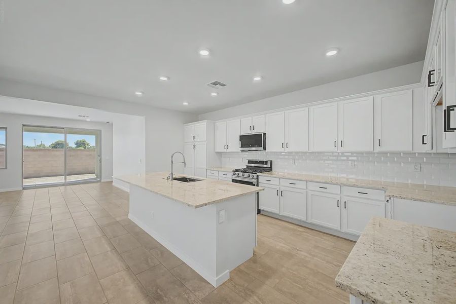 Furnished interior view inside a new home in Avanti at Granite Vista, Waddell (Image 9).