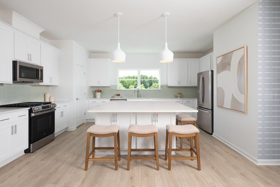 Furnished interior in a model home at Preserve at The Point in Rolesville (Image 6).