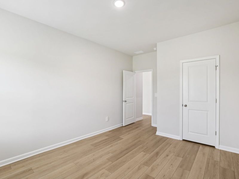 Spacious, unfurnished interior of a new home in River Glen, Angier (Image 13).