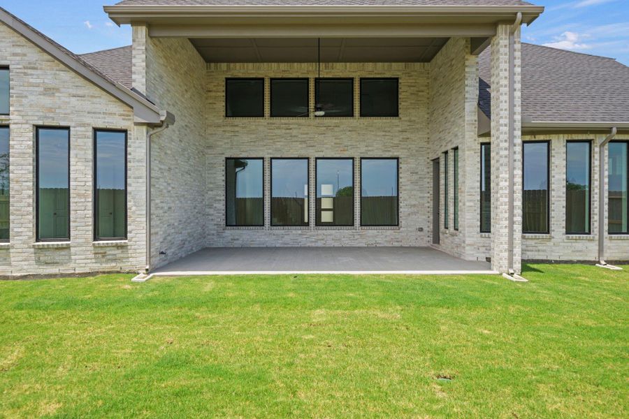 Exterior details and patio area of a home in Harvest Green, Richmond (Image 23). Exterior details and patio area of a home in Harvest Green, Richmond (Image 23).