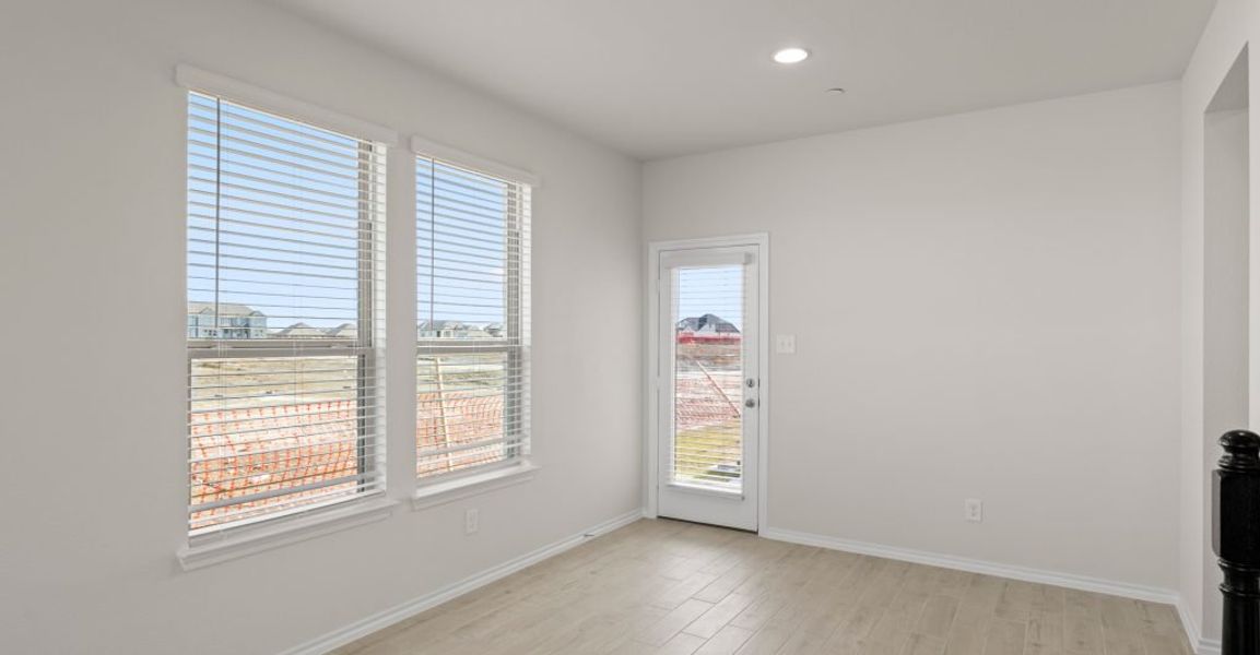 Representative exterior photo of a completed home built from the Caddo by Impression Homes in Creekshaw, Royse City, TX (Image 12).