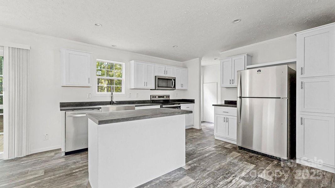 Furnished interior view inside a new home in , Statesville (Image 8).