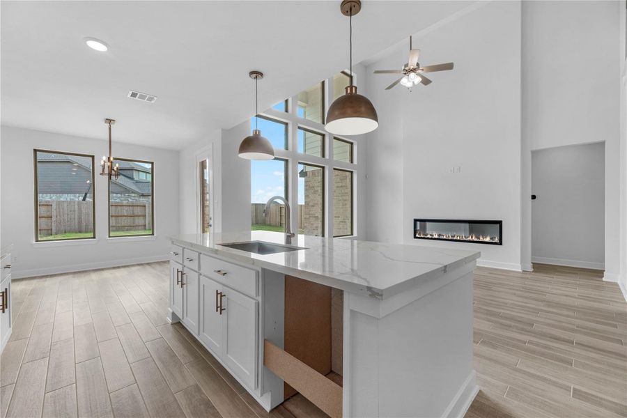 Furnished interior view inside a new home in Sunterra, Katy (Image 11).