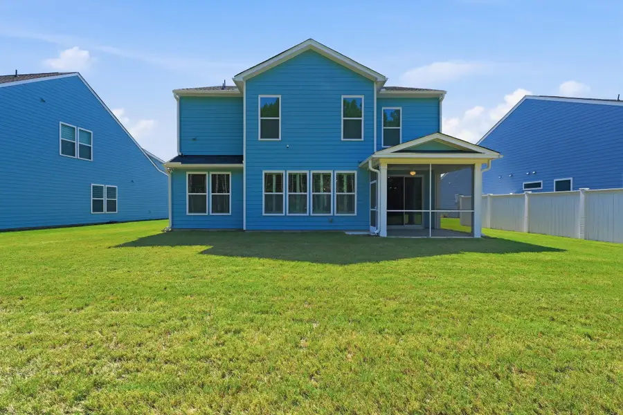 Exterior details and patio area of a home in , Ravenel (Image 26).