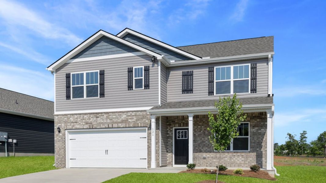 Front exterior of a new home in Woodglen, Piedmont, SC, highlighting curb appeal (Image 2). Front exterior of a new home in Woodglen, Piedmont, SC, highlighting curb appeal (Image 2).