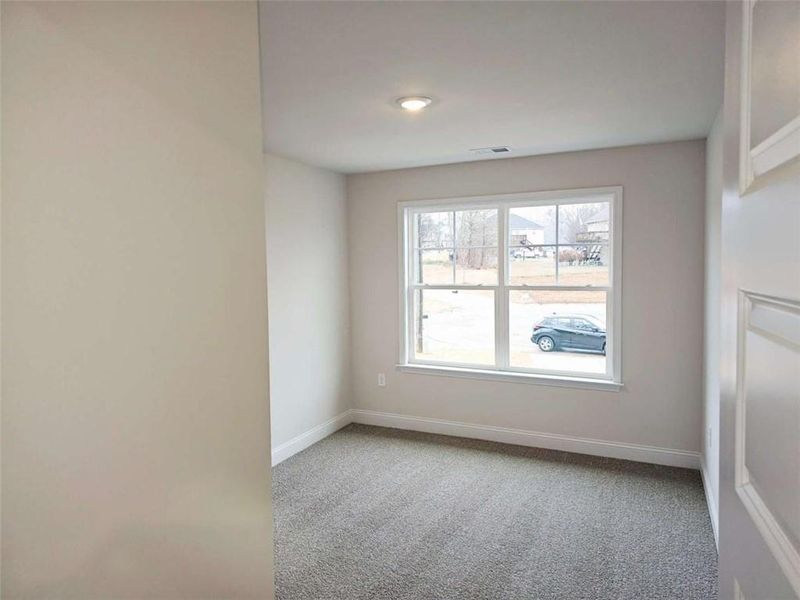 Spacious, unfurnished interior of a new home in Scarlett Place, Bowdon (Image 9).