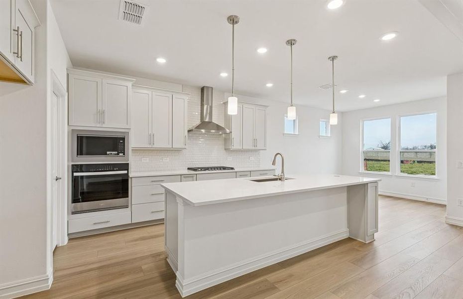 Pendant lighting over island