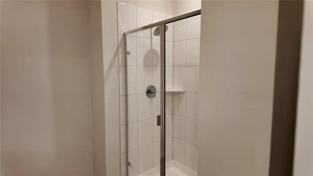 Bathroom with a stall shower