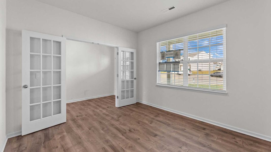 Spacious, unfurnished interior of a new home in Beaver Dam Crossing, Bailey (Image 12).