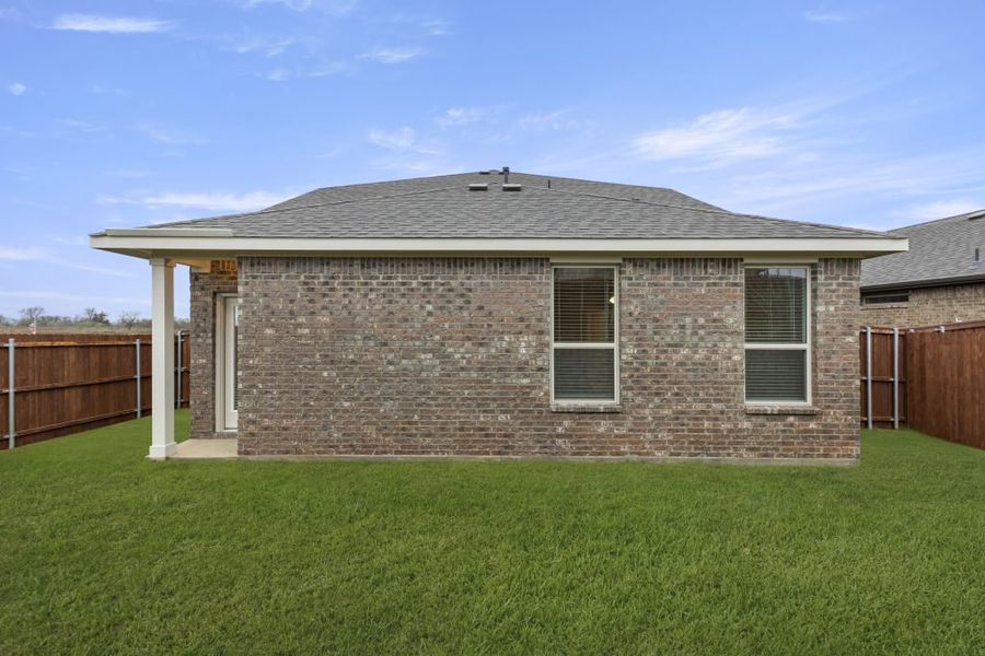 Representative exterior photo of a completed home built from the Willow by Impression Homes in Northspur, Terrell, TX (Image 27). Representative exterior photo of a completed home built from the Willow by Impression Homes in Northspur, Terrell, TX (Image 27).