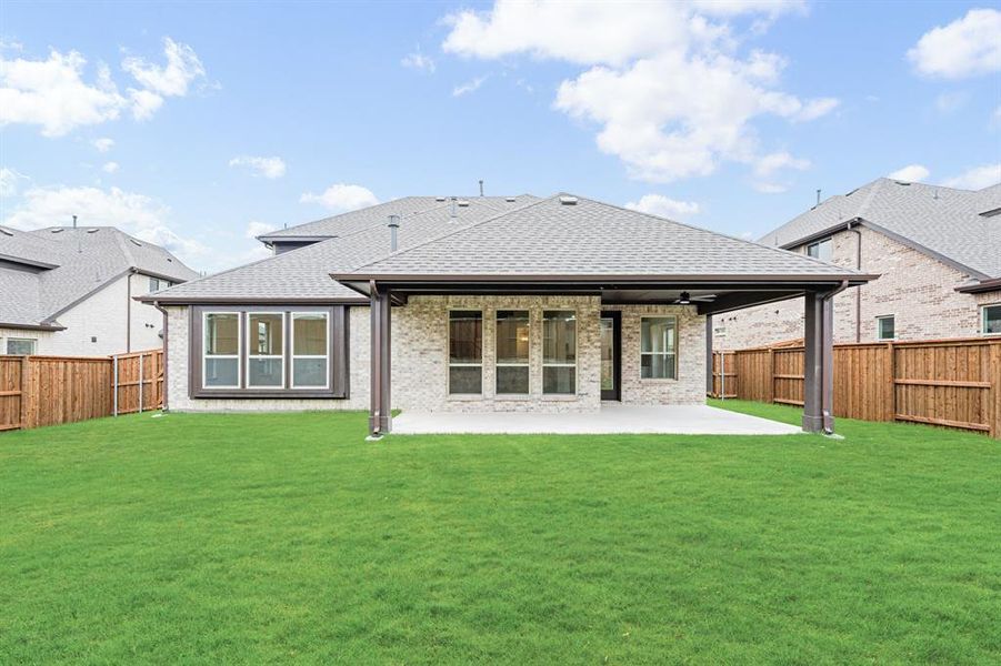 Exterior details and patio area of a home in Windsong Ranch Classic 61, Prosper (Image 27).