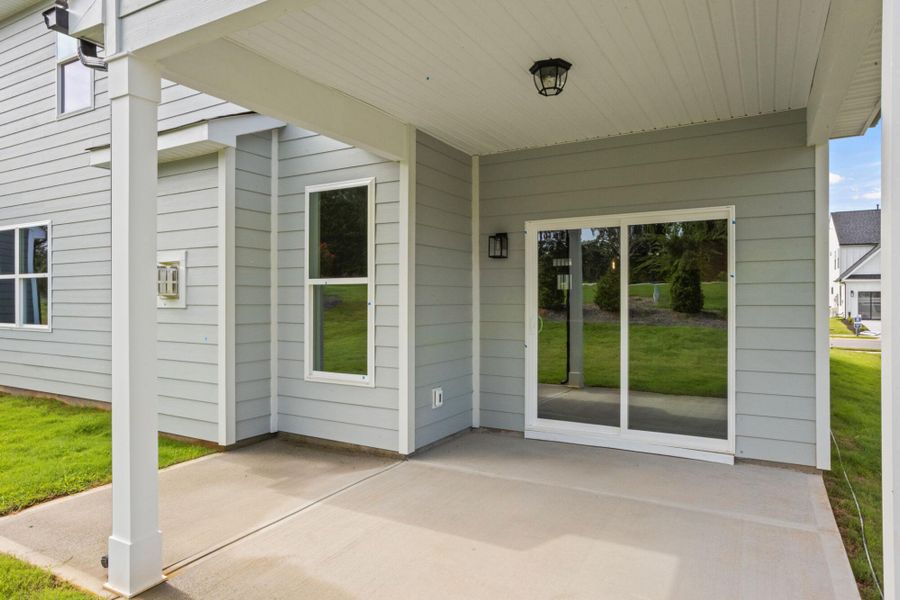 Exterior details and patio area of a home in Founders Club, Moore (Image 17).