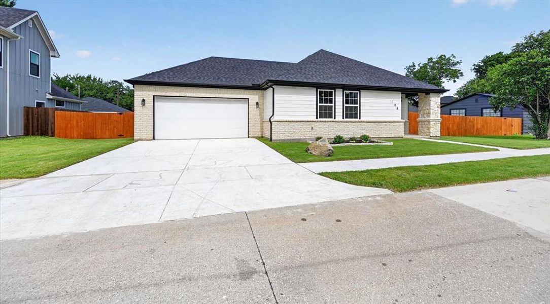 Front exterior of a new home in , Waxahachie, TX, highlighting curb appeal (Image 2). Front exterior of a new home in , Waxahachie, TX, highlighting curb appeal (Image 2).