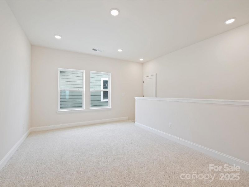 Spacious, unfurnished interior of a new home in Encore at Streamside - Classic Series, Waxhaw (Image 33).