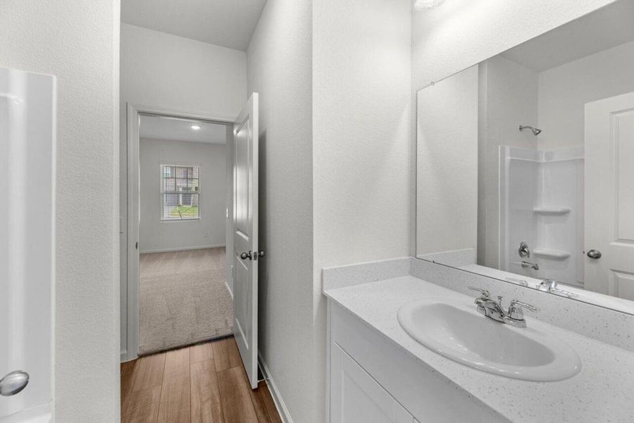 Furnished interior view inside a new home in Cedar Pointe, Crosby (Image 6).