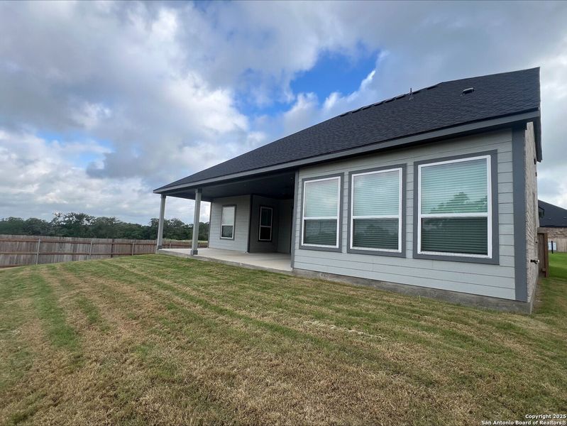 Front exterior of a new home in , Castroville, TX, highlighting curb appeal (Image 2). Front exterior of a new home in , Castroville, TX, highlighting curb appeal (Image 2).
