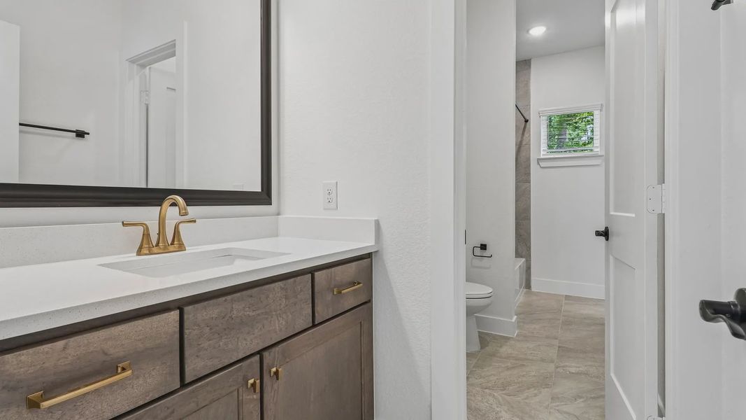 Furnished interior view inside a new home in The Woodland Hills 50', Willis (Image 13). Furnished interior view inside a new home in The Woodland Hills 50', Willis (Image 13).