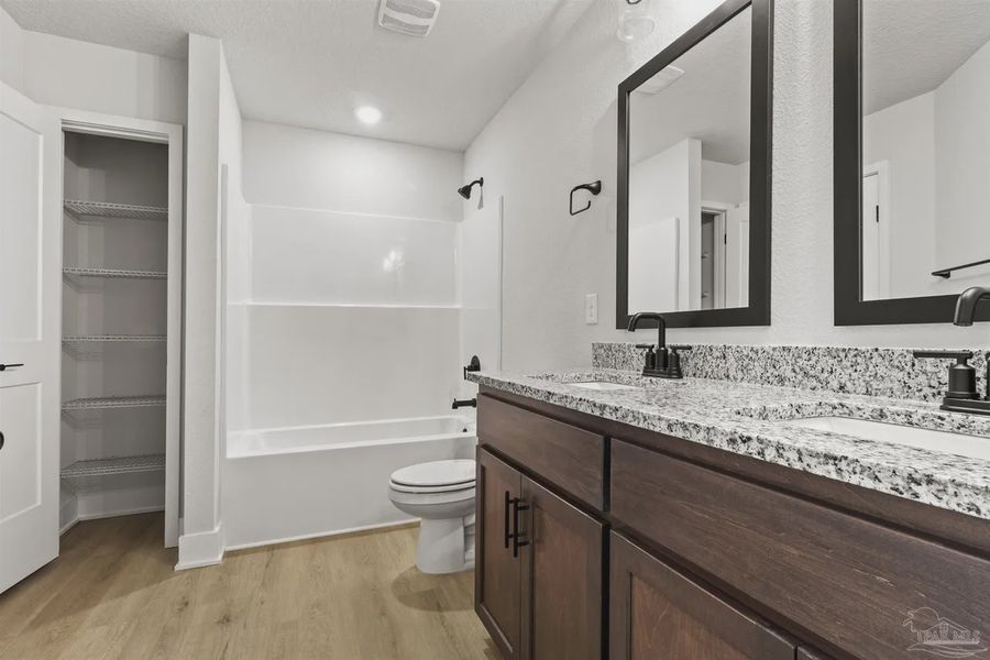 Furnished interior view inside a new home in Pecan Valley, Cantonment (Image 5).