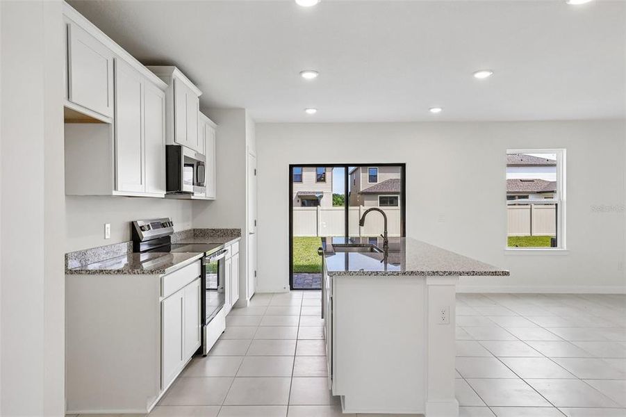 Furnished interior view inside a new home in Grasslands West, Lakeland (Image 10).