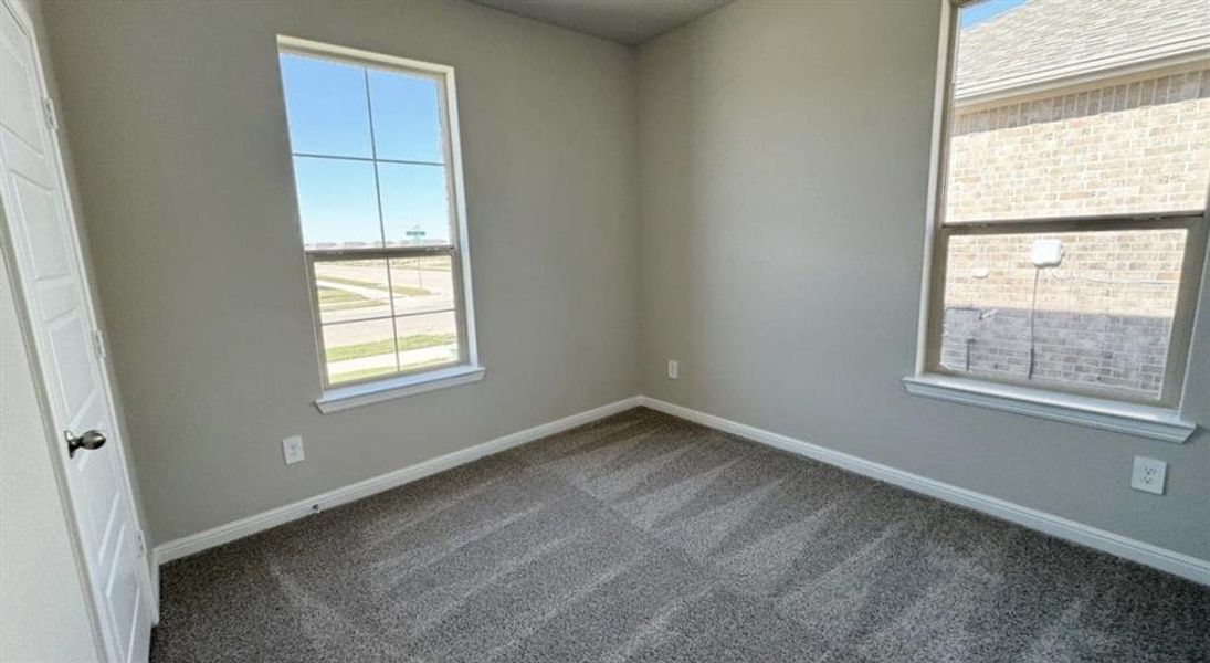 Spacious, unfurnished interior of a new home in Monarch at the Meadows, Ponder (Image 11).