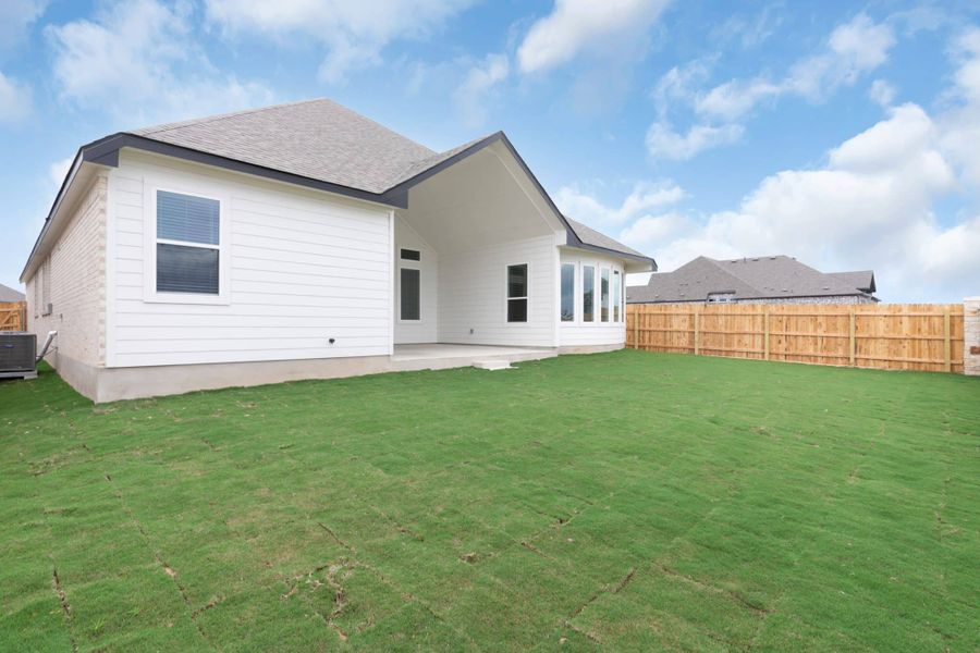 Exterior details and patio area of a home in The Grove at Blackhawk, Pflugerville (Image 4).