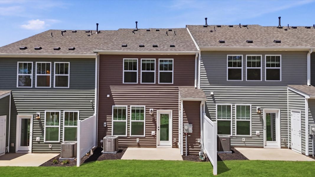 Refined rear exterior with a stylish porch for dining, relaxing, or entertaining located at the Marion Square community