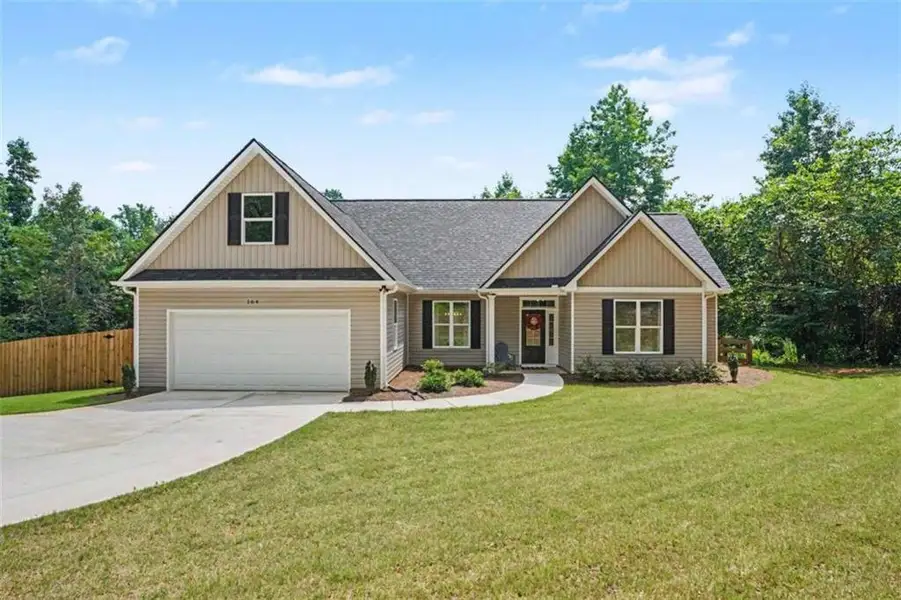 Front exterior of a new home in , Griffin, GA, highlighting curb appeal (Image 22). Front exterior of a new home in , Griffin, GA, highlighting curb appeal (Image 22).