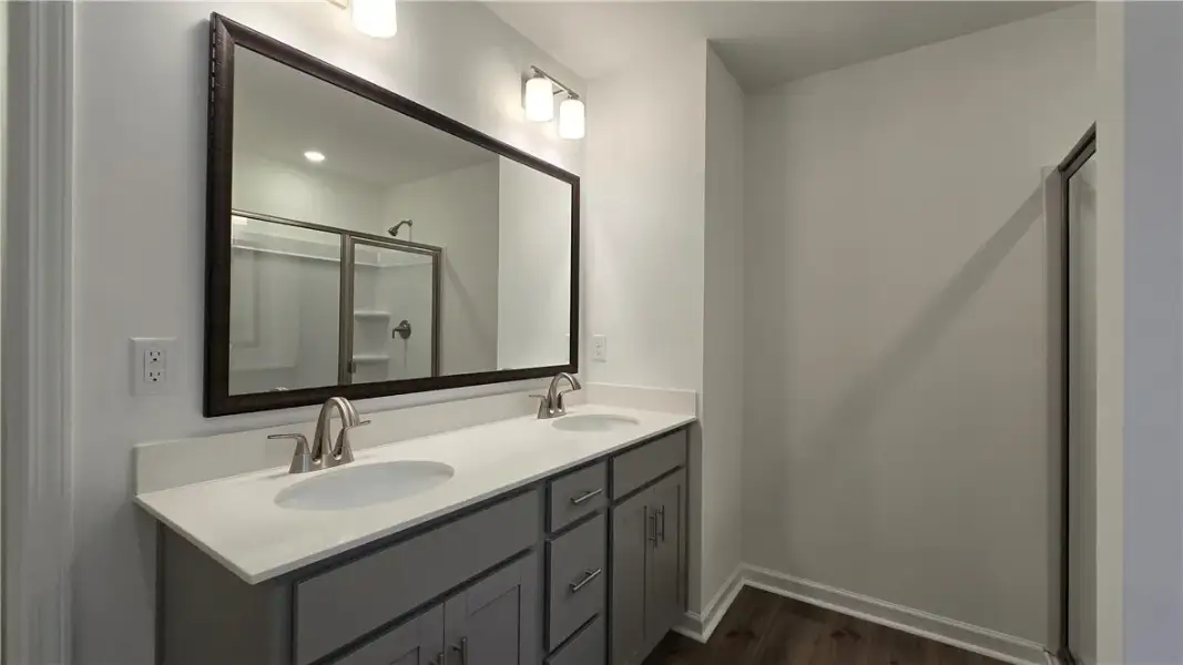 Clean lines and a double vanity define this contem