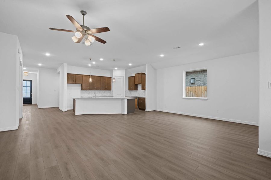 Gathering room. Sample product photo. Actual exterior and interior selections may vary by homesite. Photo may be virtually staged.
